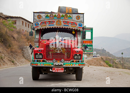 Colourful lorry transporting goods. Tata Bhutan Asia. Decorated in bright colours. Stock Photo