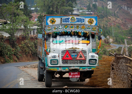 Colourful lorry transporting goods. Tata Bhutan Asia. Decorated in bright colours. Stock Photo