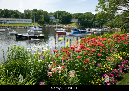 Colorful gardens full of flowers next to a restaurant Ogunquit Perkins Cove Maine USA Stock Photo