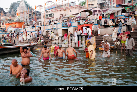 Hindu holy men performing religious ceremony puja Varanasi India Stock ...