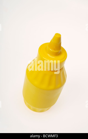 Yellow mustard bottle no label on white background no label. Stock Photo