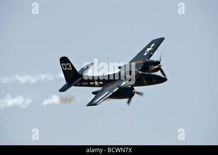 A Grumman Tigercat flies at an airshow Stock Photo