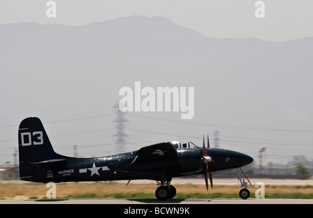 A Grumman Tigercat touches down on the runway. Stock Photo