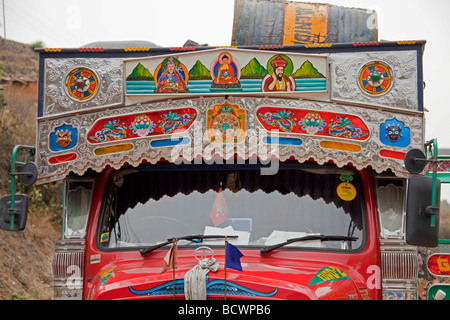 Colourful lorry transporting goods. Tata Bhutan Asia. Decorated in bright colours. Stock Photo