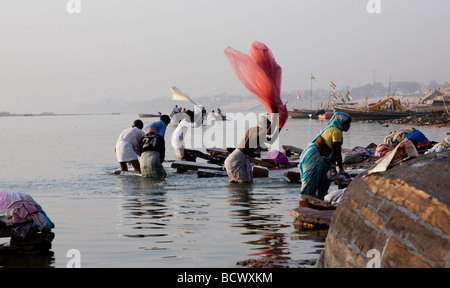 Dhobi Washing Clothes in the Ganges River in Varanasi India Stock Photo ...