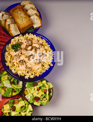 Country kitchen recipes, beef stroganoff, easy Caesar salad, poppy seed bread. Stock Photo