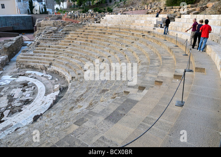 Ancient ruins of Roman theatre below Alcazaba fort in Malaga Costa del Sol Andalusia Spain Stock Photo