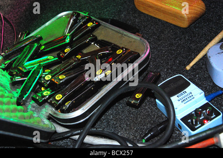 harmonica case and effect switches  on stage Stock Photo