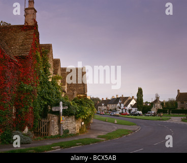 Ivy covered houses in Biddestone village Wiltshire England Stock Photo