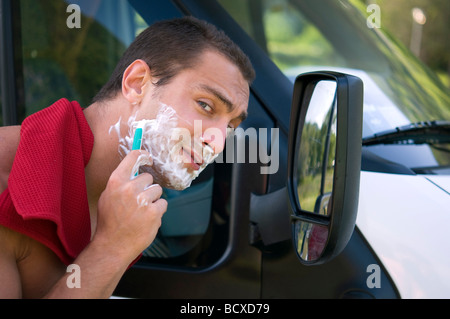 young man having a shave Stock Photo