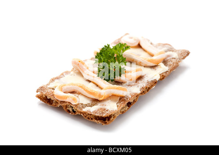 Swedish rye bread with butter caviar and parsley Shallow d o f Stock Photo