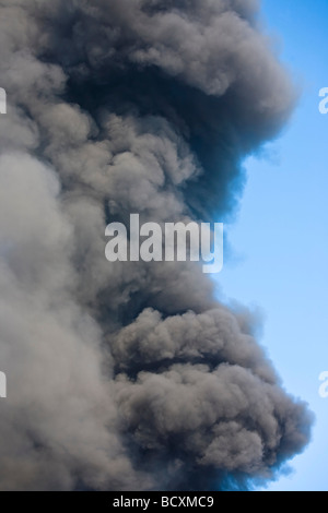 Thick dangerous smoke from fire Stock Photo