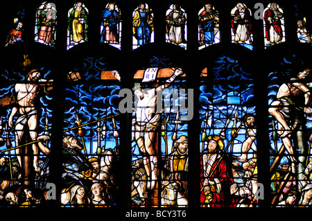 The East Stained Glass Window  depicting the cruxifiction in Peterhouse College Chapel, Cambridge England UK Stock Photo