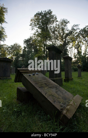 tilted tombstone at abandoned jewish cemetery, Essen-Kettwig, Germany Stock Photo