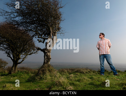 man admiring tree Stock Photo