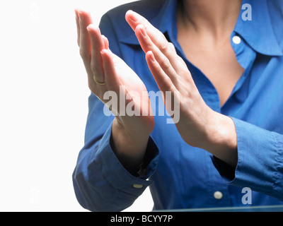 Hands of a woman, applauding Stock Photo