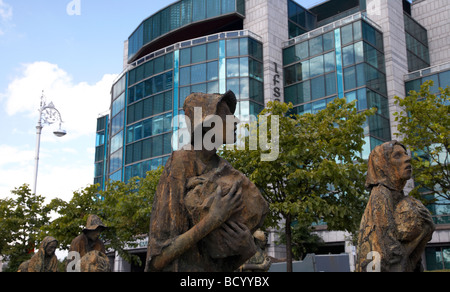 The famine memorial statues by rowan gillespie on custom house quay outside the IFSC irish financial services centre Stock Photo