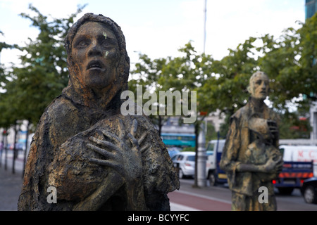 The famine memorial statues by rowan gillespie on custom house quay in the docklands dublin city centre republic of ireland Stock Photo