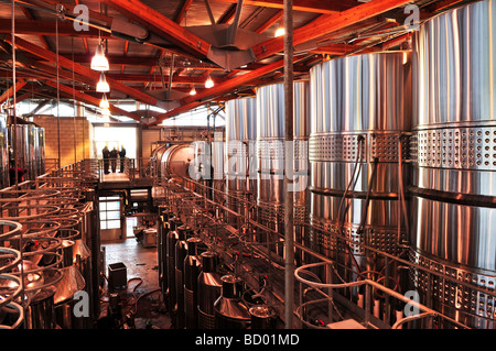 Wine making vats and equipment in tour of winery Stock Photo