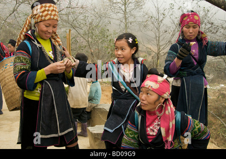 A group of Happy Hmong women mountain guides in Sapa Northern Vietnam Stock Photo