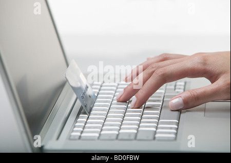 Woman doing shopping online Stock Photo