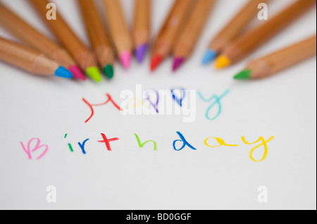 Happy birthday and colouring pencils Stock Photo - Alamy