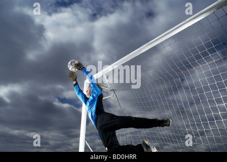 goalkeeper diving Stock Photo