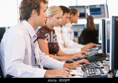 Stock Traders Working At Computers Stock Photo