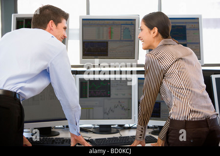 Stock Traders Viewing Monitors Stock Photo