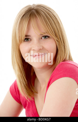 A 16 year old pretty caucasian girl shows a facial expression of Stock ...