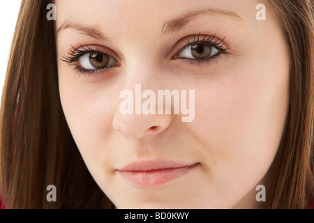Studio Portrait Of Smiling Teenage Girl