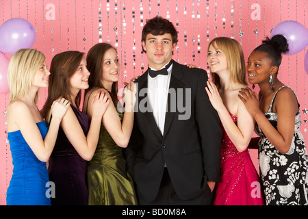 Teenage Girls Looking At Attractive Boy Stock Photo