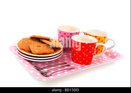 speckles cups and saucers on tray isolated over white Stock Photo