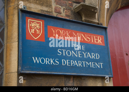 Close up of sign outside the entrance to York Minsters stoneyard works department York North Yorkshire England UK United Kingdom Stock Photo