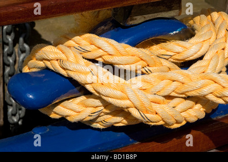 Rope wound round a boat cleat. Stock Photo