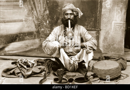 Indian Snake Charmer Playing Pipe for Snakes Stock Photo