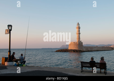 Angling in the Venetian Harbour at sunset. Chania, Crete, Greece Stock Photo