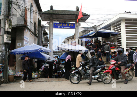 Bustling street scene outside Sapa Market in North Vietnam Stock Photo