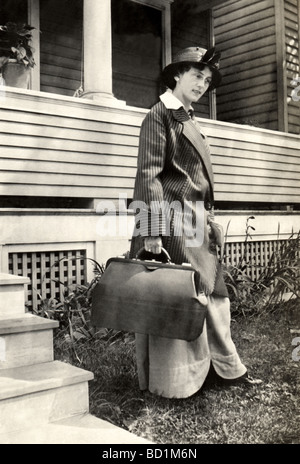 Woman Leaving Home on a Trip Stock Photo