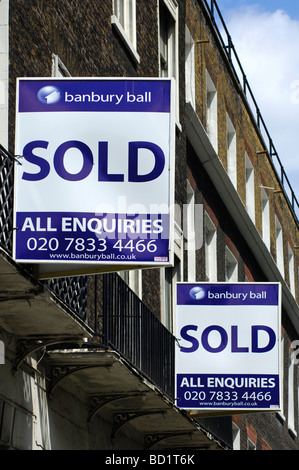 Sold signs of the Banbury Ball estate agents at a building London United Kingdom Stock Photo