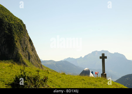 Wild camping in the French Alps. Waiting for the Tour de France to arrive at the top of an alpine climb. Stock Photo