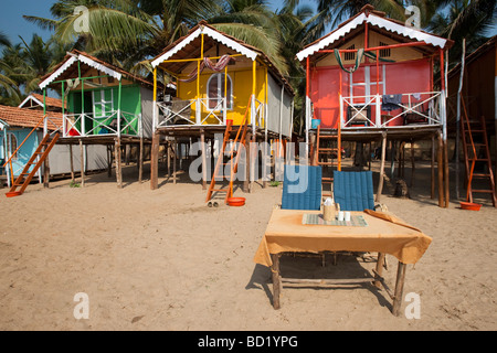 Cocohuts beach holiday bungalows on stilts Agonda beach Goa India Stock Photo