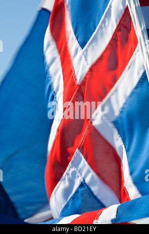 A slow shutter speed shot of the Icelandic flag with deliberate motion blur Stock Photo