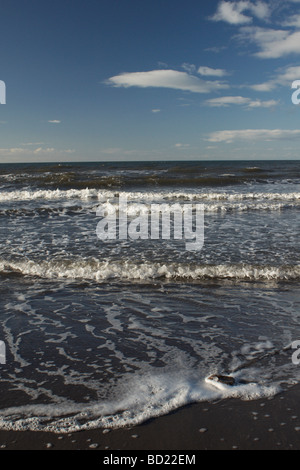 The beach and sea on a sunny day in April 2009 Whitby England Stock Photo