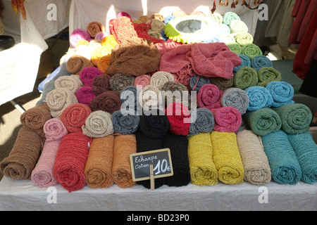 Colored coloured wools on sale in street market,Provence,South of France Stock Photo