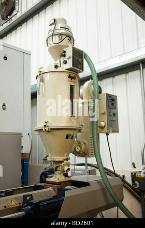hopper feeder on injection moulding machine Stock Photo - Alamy