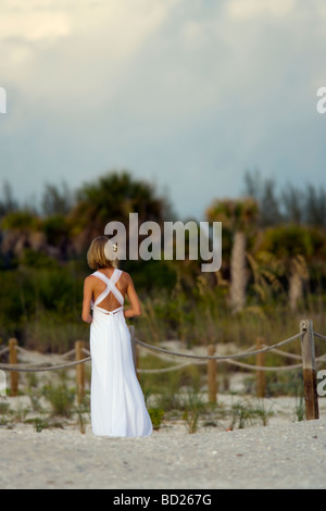 Bride standing on beach - Sanibel Island, Florida Stock Photo
