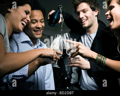 Two couples champagne Stock Photo