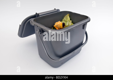 Kitchen compost caddy against white background Stock Photo