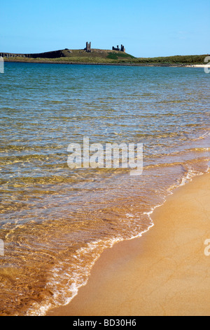 Dunstanburgh Castle from Embleton Bay, Northumberland, Northeast England, UK Stock Photo